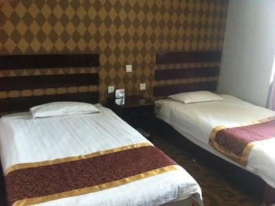 Xinhang Hotel Urumqi Extérieur photo