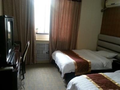 Xinhang Hotel Urumqi Extérieur photo