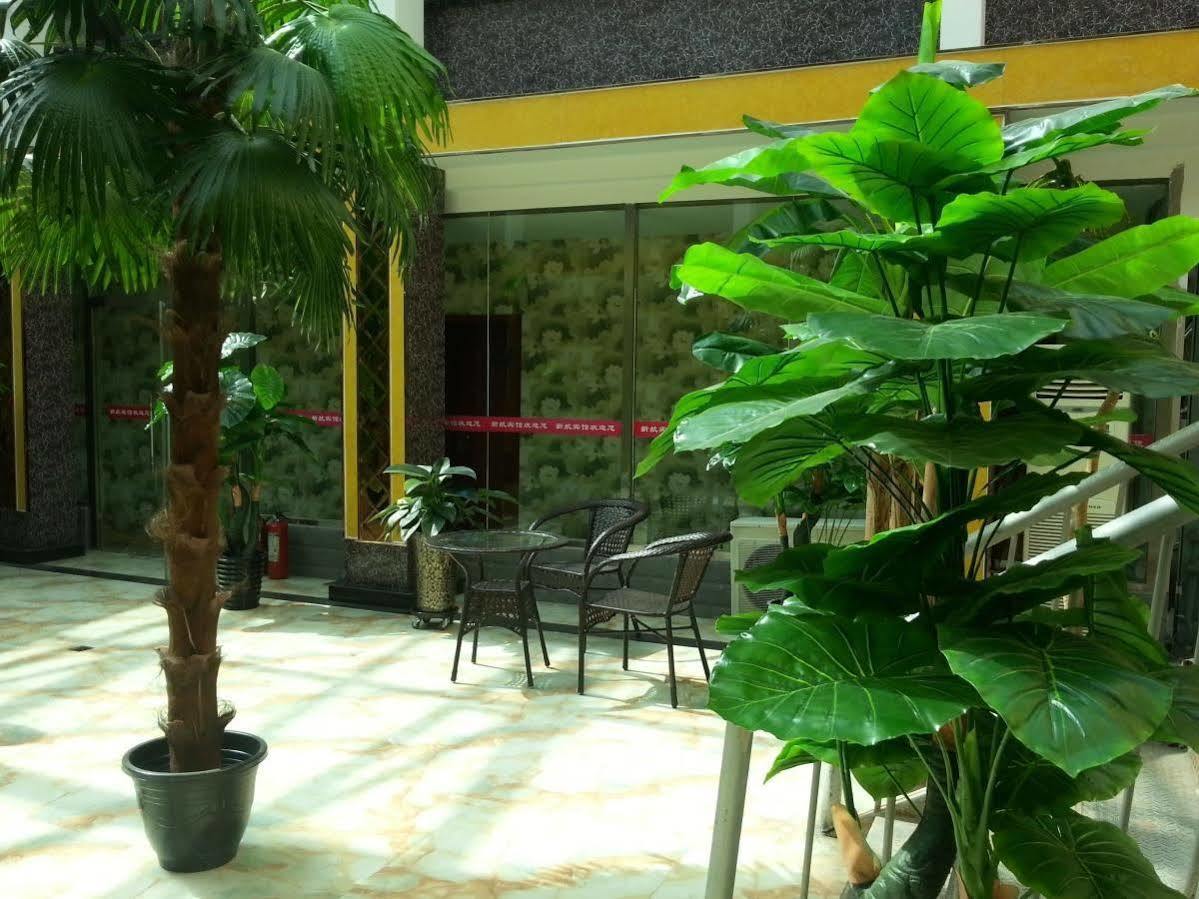 Xinhang Hotel Urumqi Extérieur photo